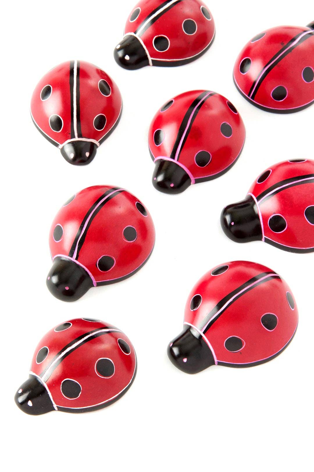 Handcrafted soapstone ladybugs.