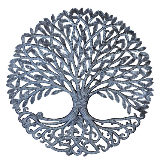 Handmade hammered metal wall art of a tree with intricate designs
