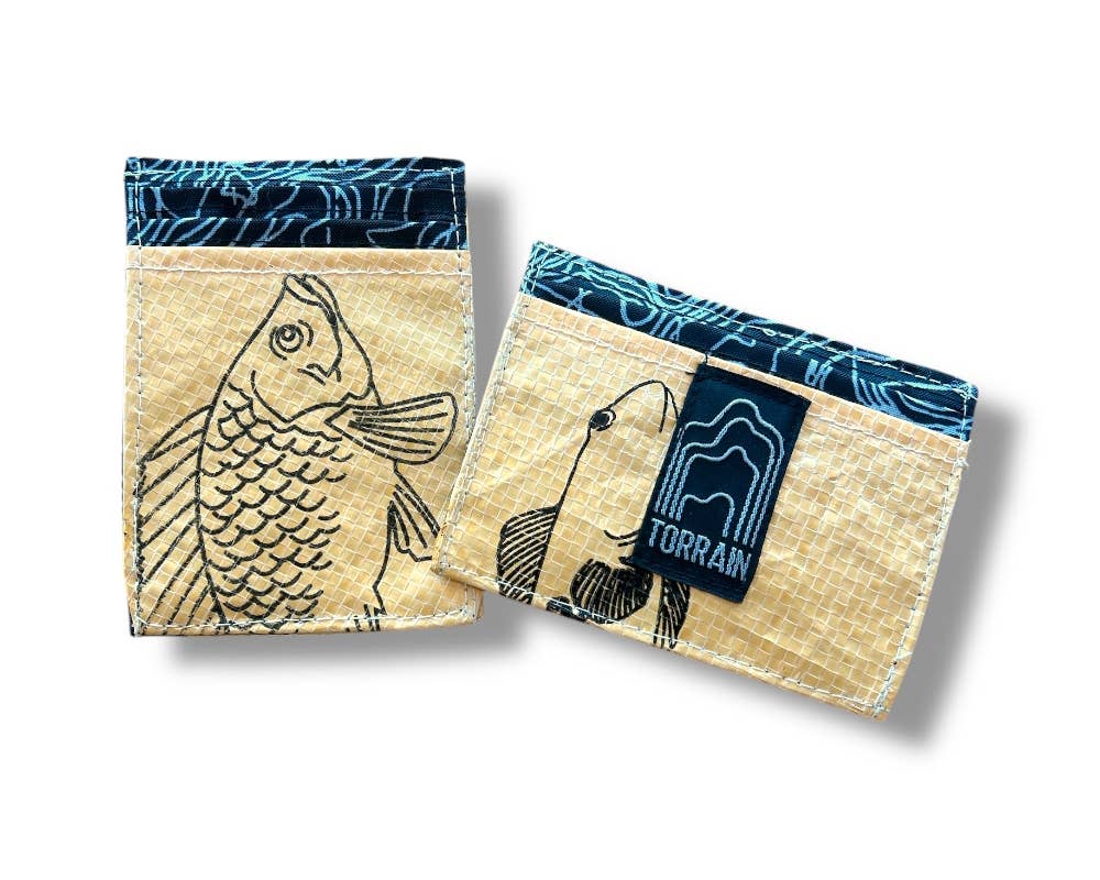 Mini wallet. Exterior material is upcycled from feed and cement bags, Interior material is recycled from plastic bottles. Each design is unique.