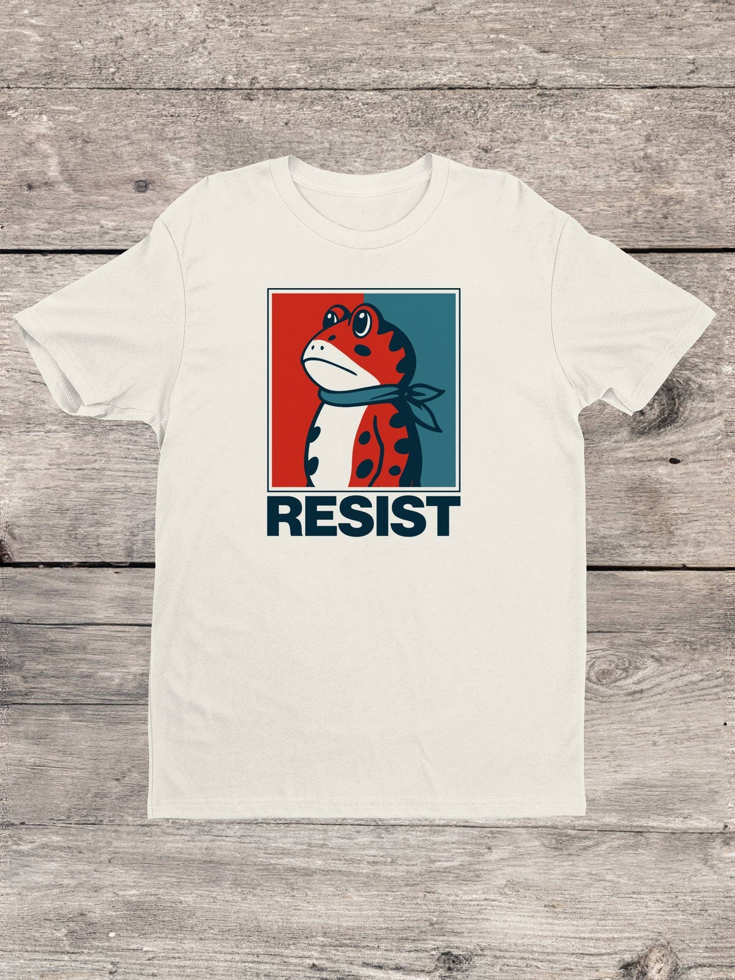 White protest t-shirt with a frog graphic and 'RESIST'