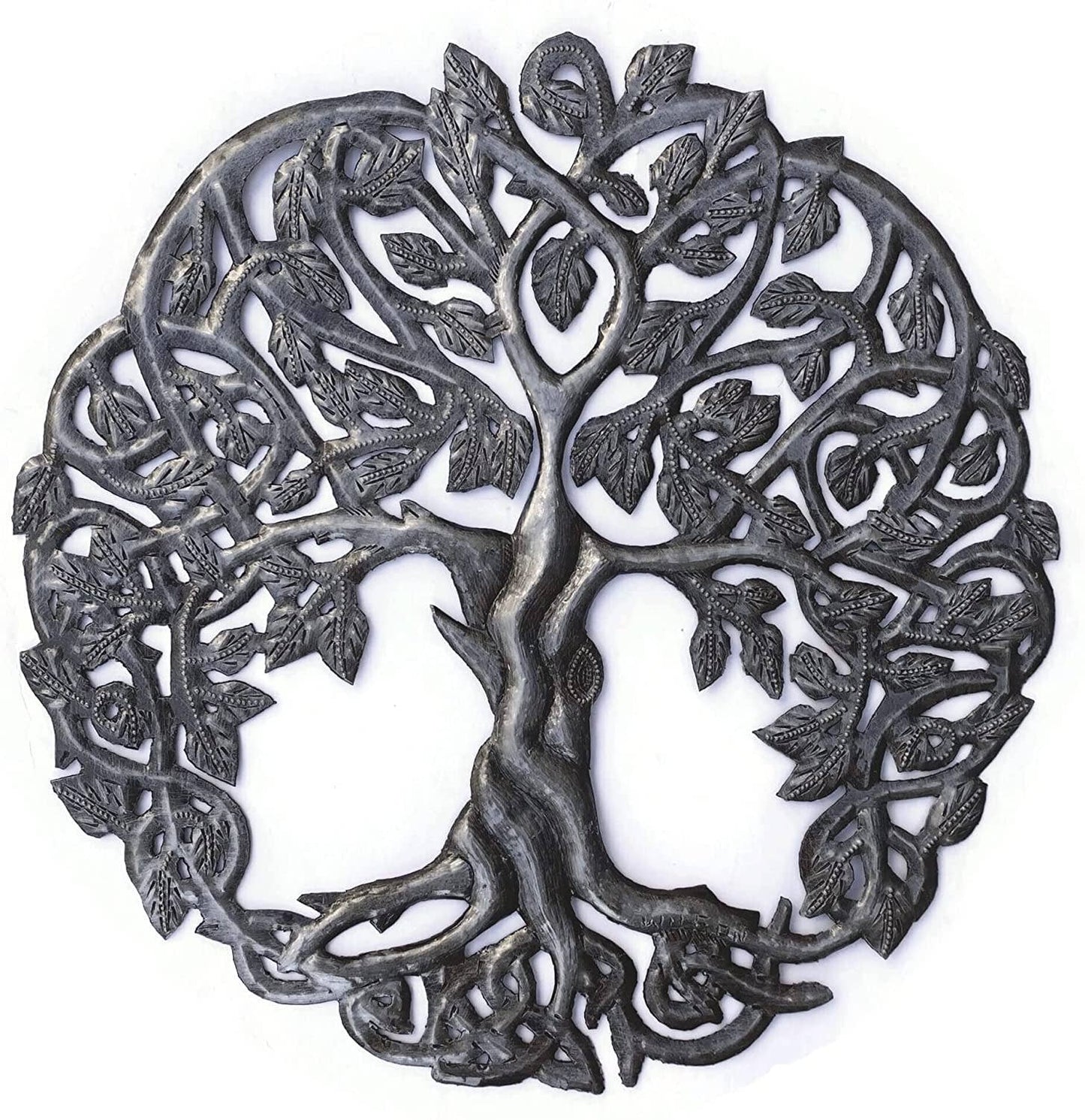 Handmade Haitian hammered metal wall art of a tree with intricate designs