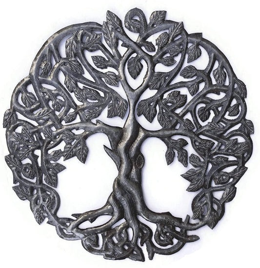 Handmade Haitian hammered metal wall art of a tree with intricate designs