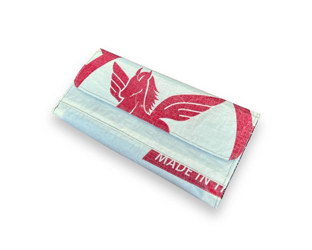 Tri-fold wallet. Exterior material is upcycled from feed and cement bags, Interior material is recycled from plastic bottles. Each design is unique.