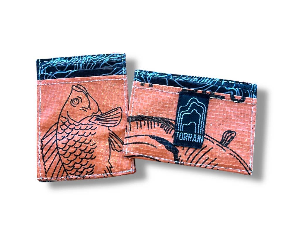 Mini wallet. Exterior material is upcycled from feed and cement bags, Interior material is recycled from plastic bottles. Each design is unique.