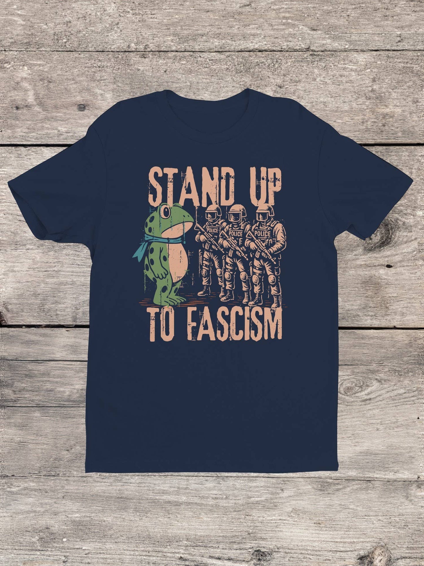 Blue t-shirt with graphic frog protest design and text 'Stand Up To Fascism'