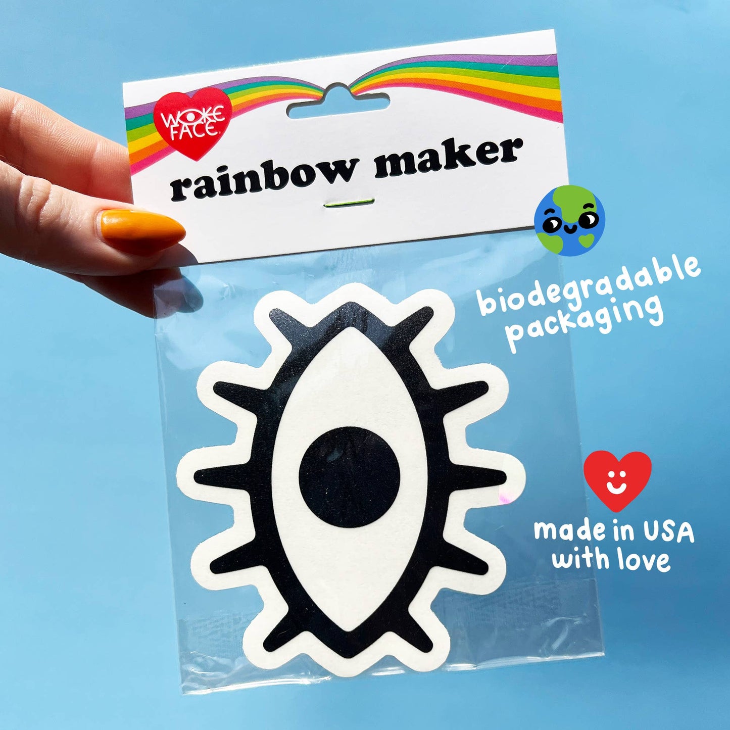 Packaged product with a sticker labeled 'rainbow maker' on a blue background