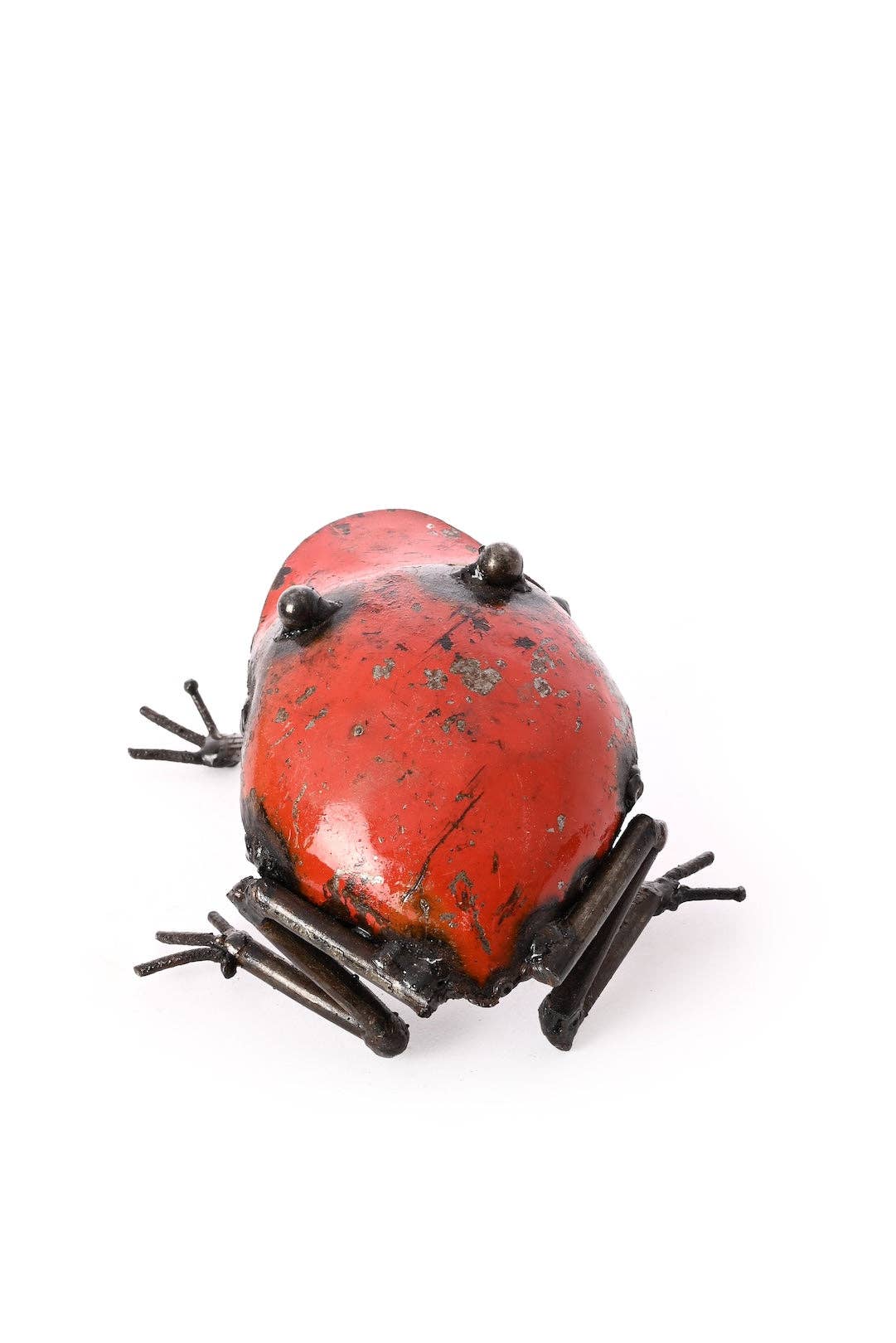 Metallic red frog figurine - from the back.