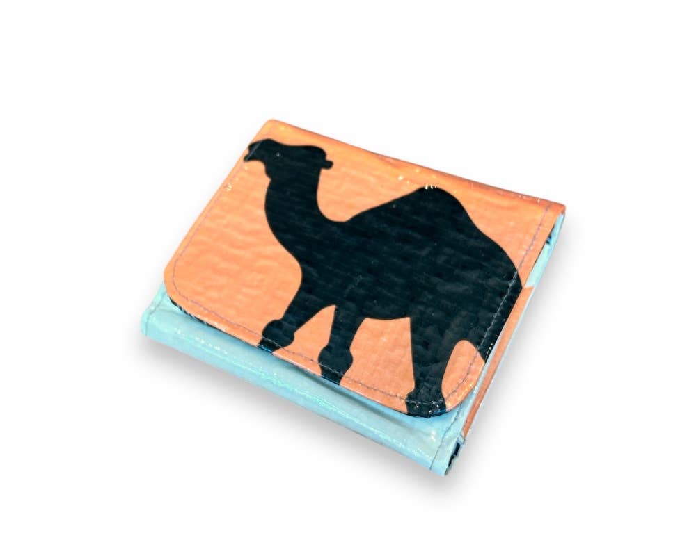 Folded wallet. Exterior material is upcycled from feed and cement bags, Interior material is recycled from plastic bottles. Each design is unique.