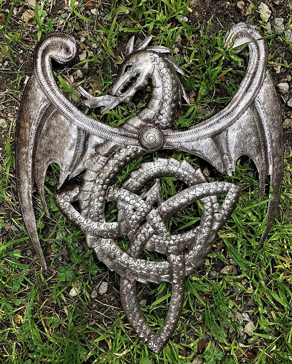 Handmade Haitian hammered metal wall art of a dragon breathing fire