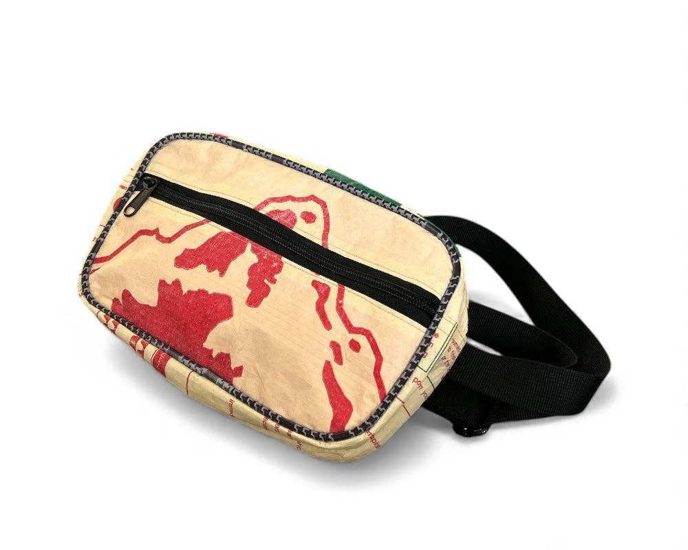 Fanny/Hip style bag. Exterior material is upcycled from feed and cement bags, Interior material is recycled from plastic bottles. Each design is unique.