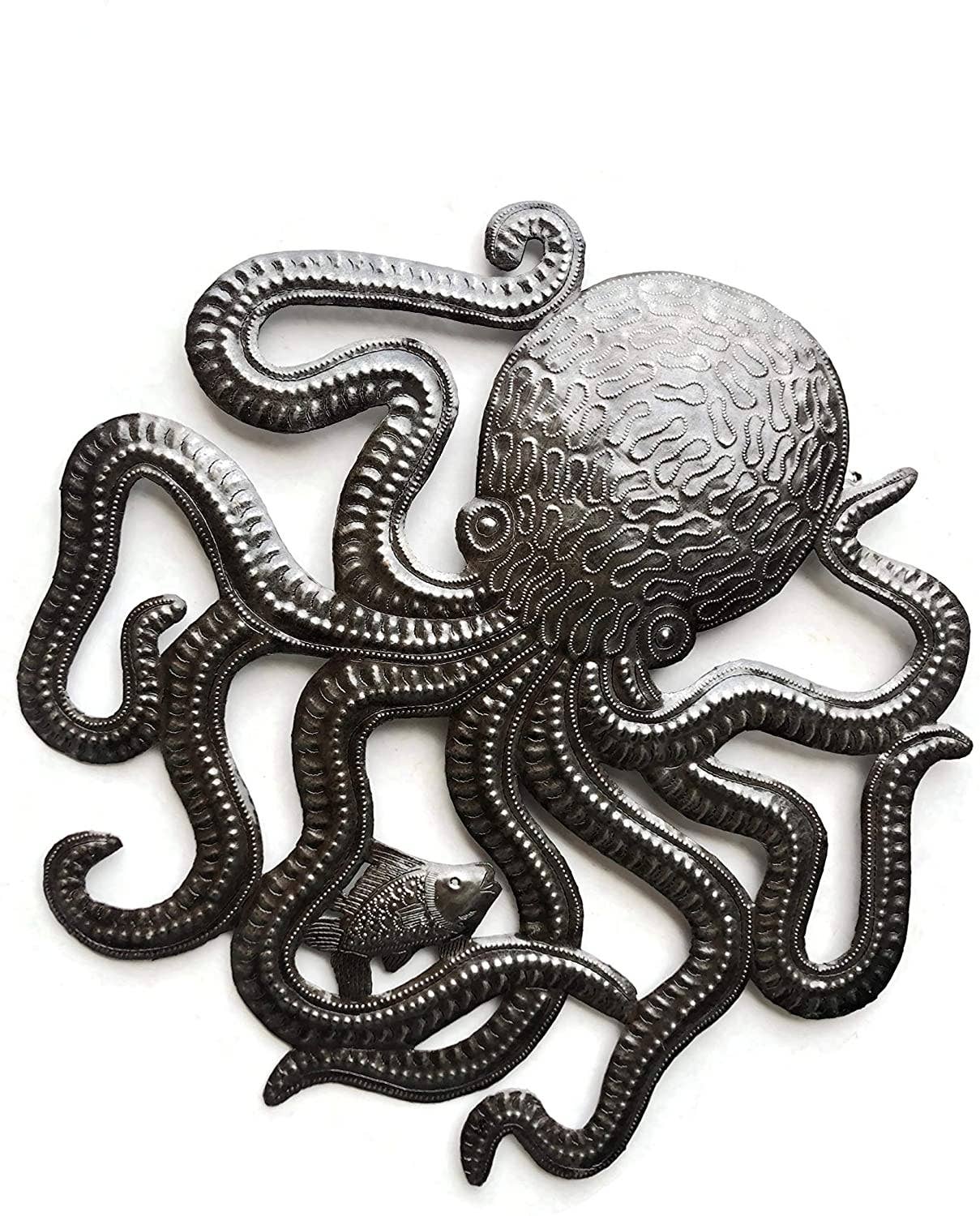 Handmade Haitian hammered metal wall art of an octopus and fish