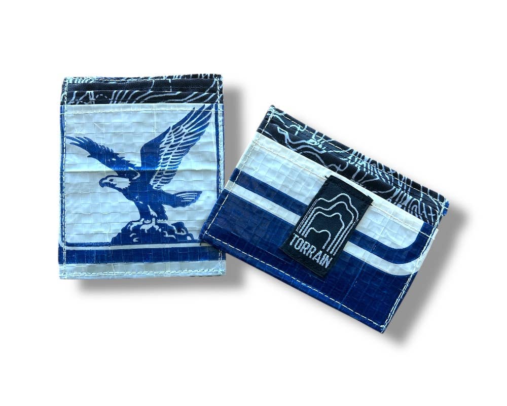Mini wallet. Exterior material is upcycled from feed and cement bags, Interior material is recycled from plastic bottles. Each design is unique.
