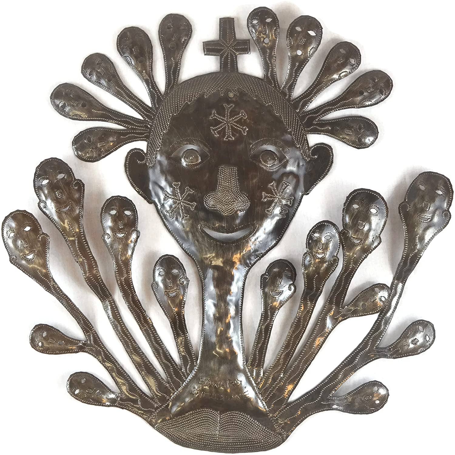 Handmade Haitian hammered metal wall art of person's face
