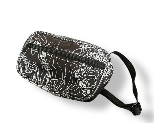 Fanny/Hip style bag. Exterior material is upcycled from feed and cement bags, Interior material is recycled from plastic bottles. Each design is unique.
