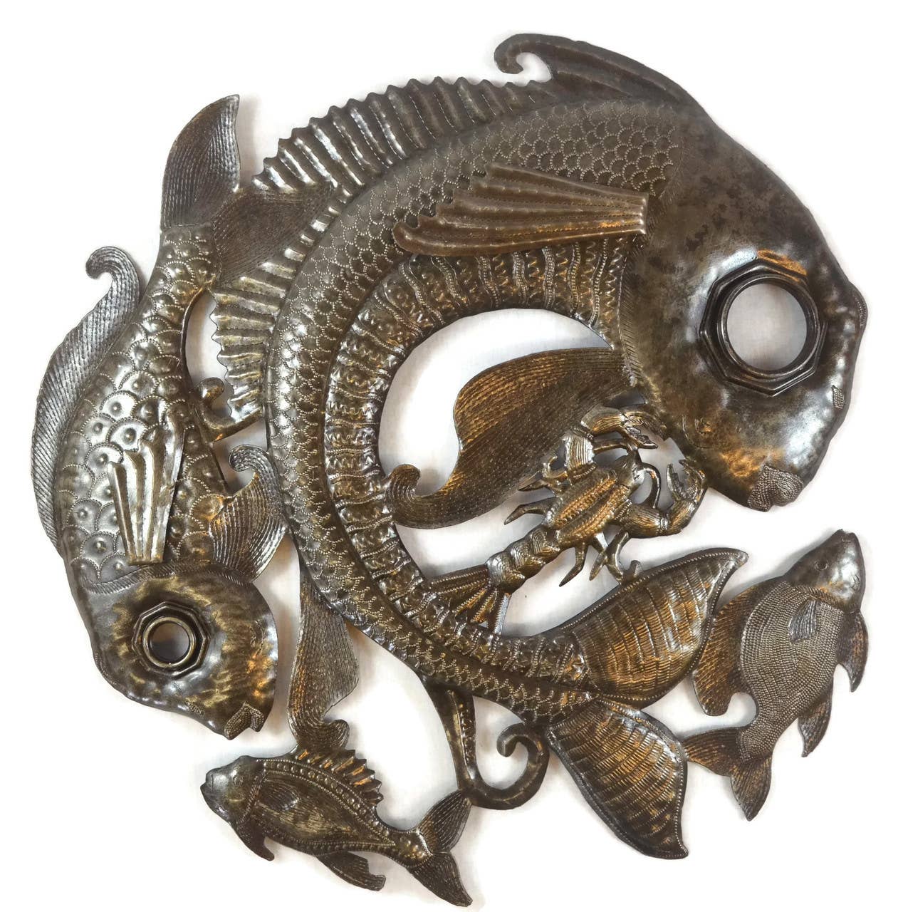 Handmade Haitian hammered metal wall art of fish and sealife