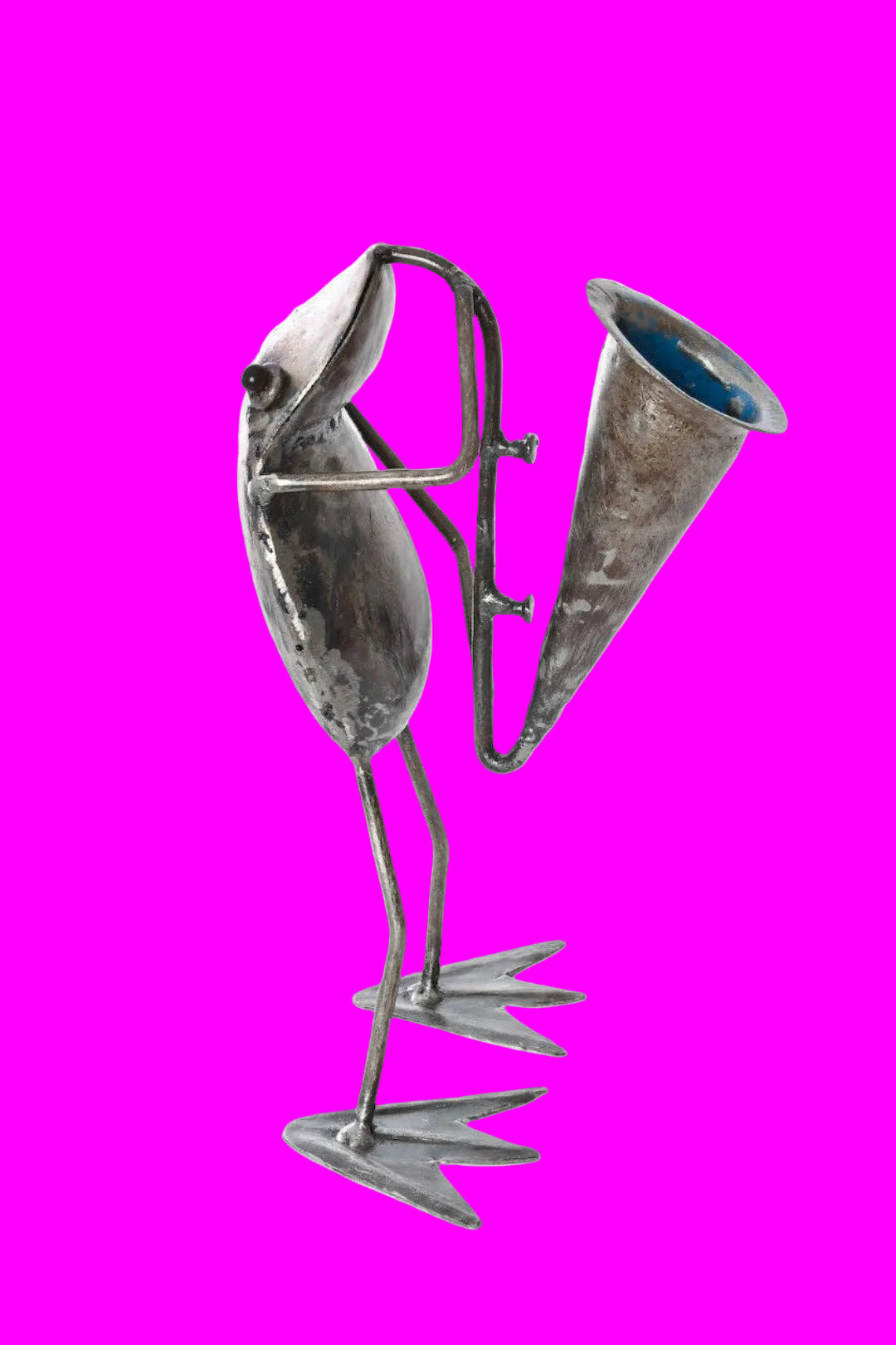 Handcrafted metallic sculpture of a frog playing a horn - facing right