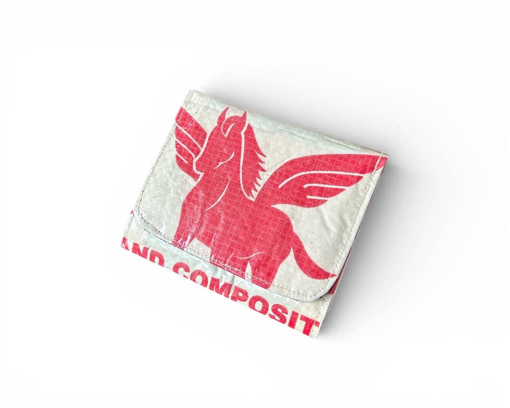 Folded wallet. Exterior material is upcycled from feed and cement bags, Interior material is recycled from plastic bottles. Each design is unique.