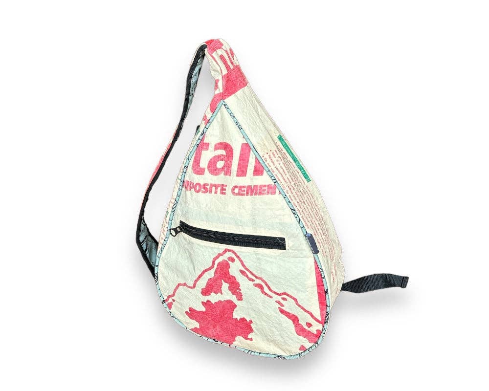 Teardrop shaped sling bag. Exterior material is upcycled from feed and cement bags, Interior material is recycled from plastic bottles. Each design is unique.