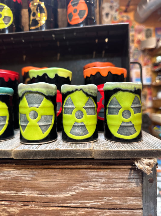 Cups with radioactive symbol design 