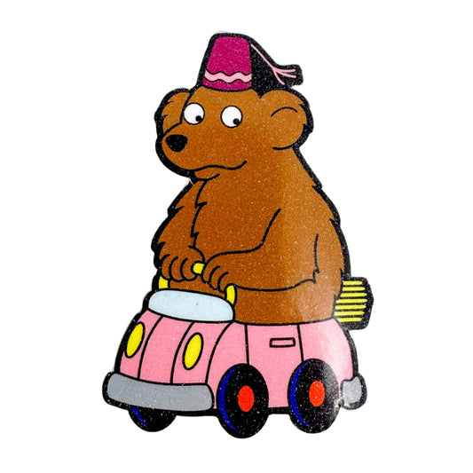 Cartoon bear riding a pink car on a white background