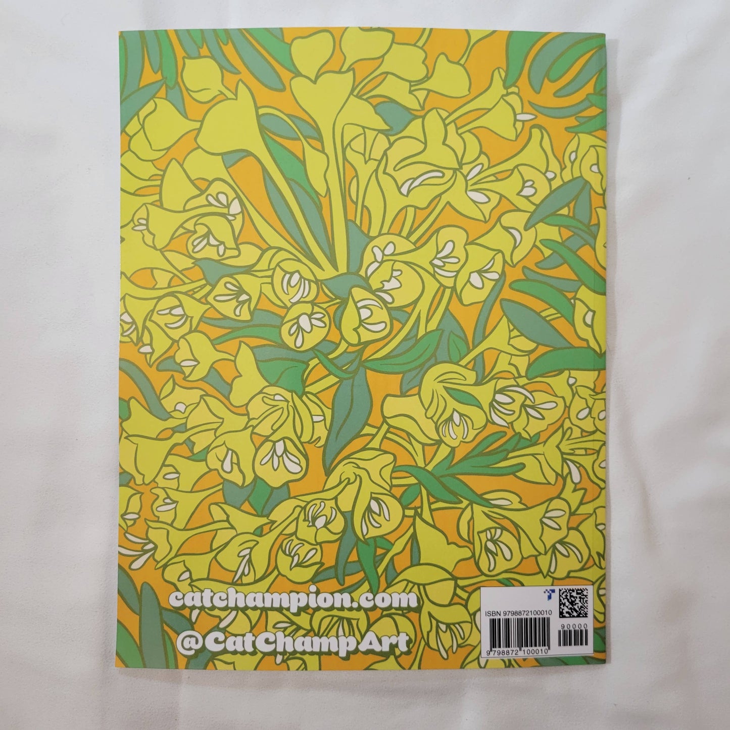 Back of coloring book with floral design