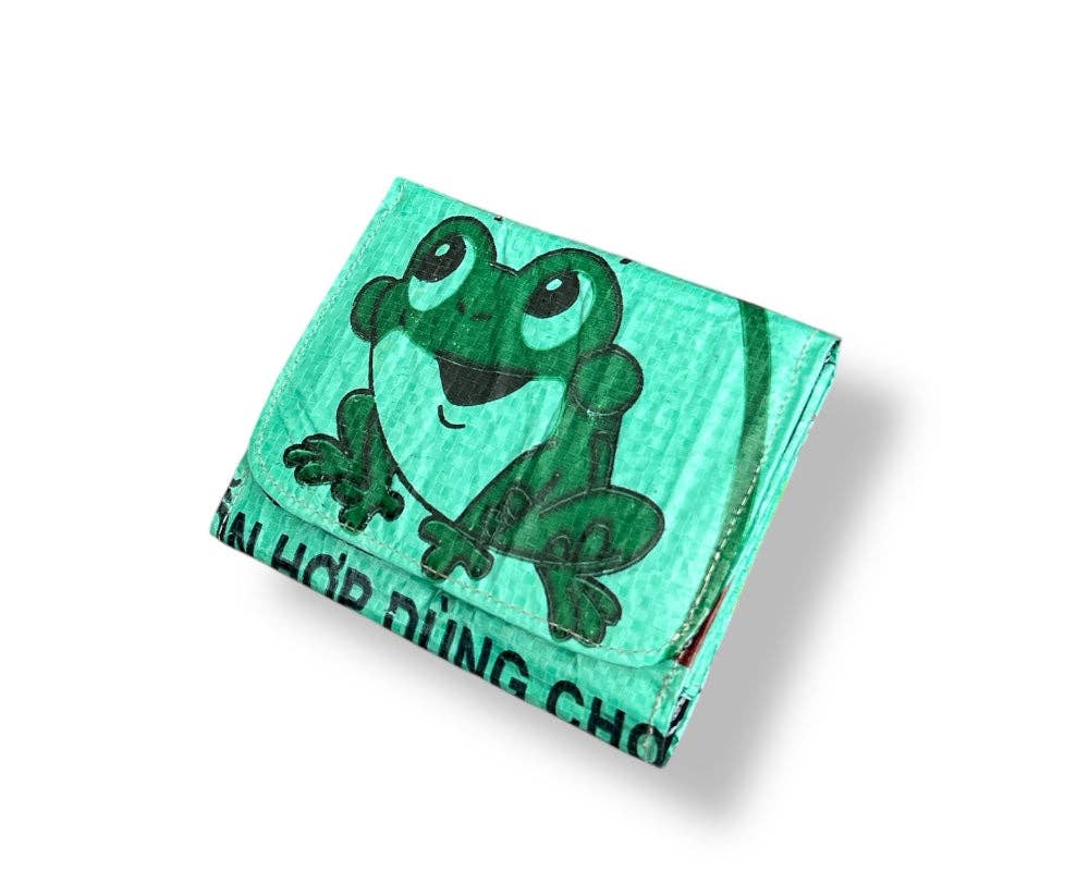 Folded wallet. Exterior material is upcycled from feed and cement bags, Interior material is recycled from plastic bottles. Each design is unique.