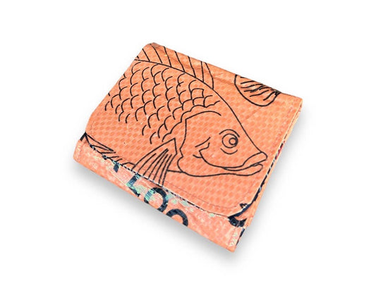 Folded wallet. Exterior material is upcycled from feed and cement bags, Interior material is recycled from plastic bottles. Each design is unique.