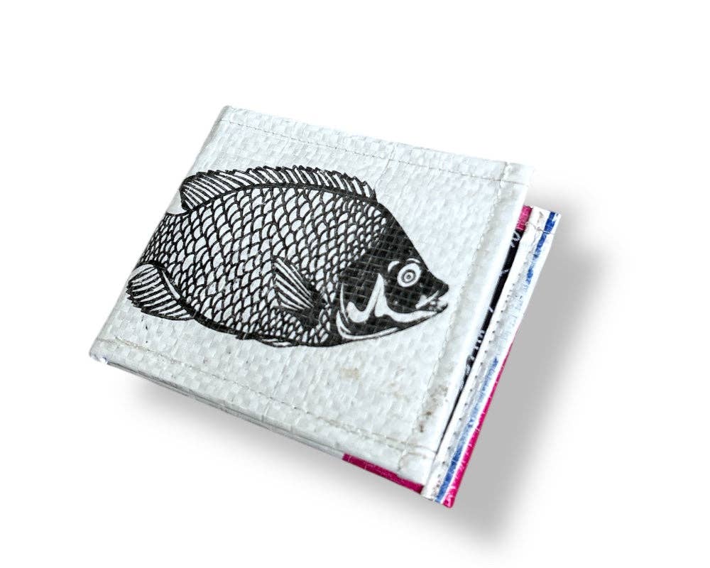 Bi-fold wallet. Exterior material is upcycled from feed and cement bags, Interior material is recycled from plastic bottles. Each design is unique.