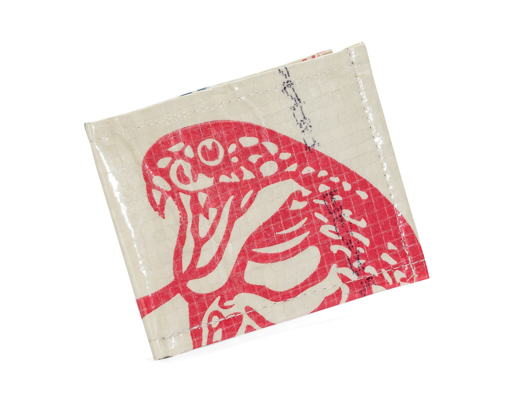 Bi-fold wallet. Exterior material is upcycled from feed and cement bags, Interior material is recycled from plastic bottles. Each design is unique.