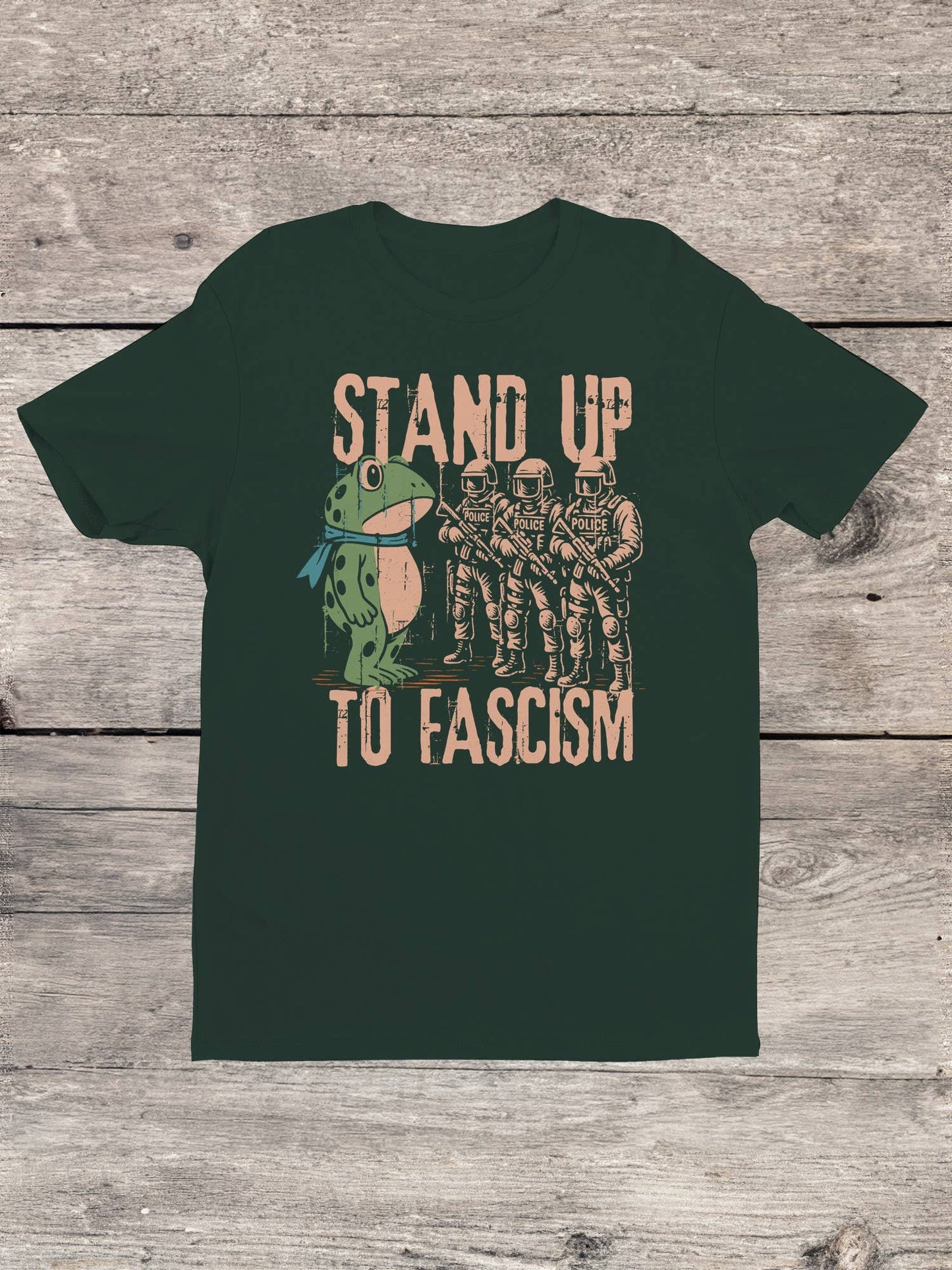 Green t-shirt with graphic frog protest design and text 'Stand Up To Fascism'
