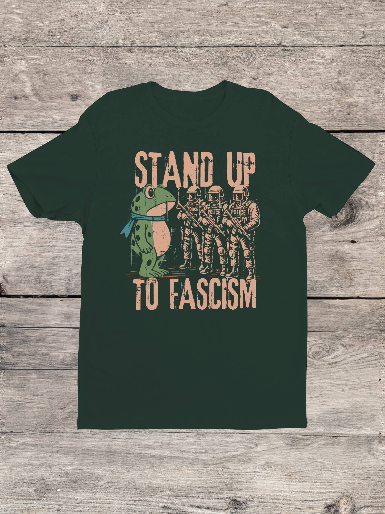 Green t-shirt with graphic frog protest design and text 'Stand Up To Fascism'