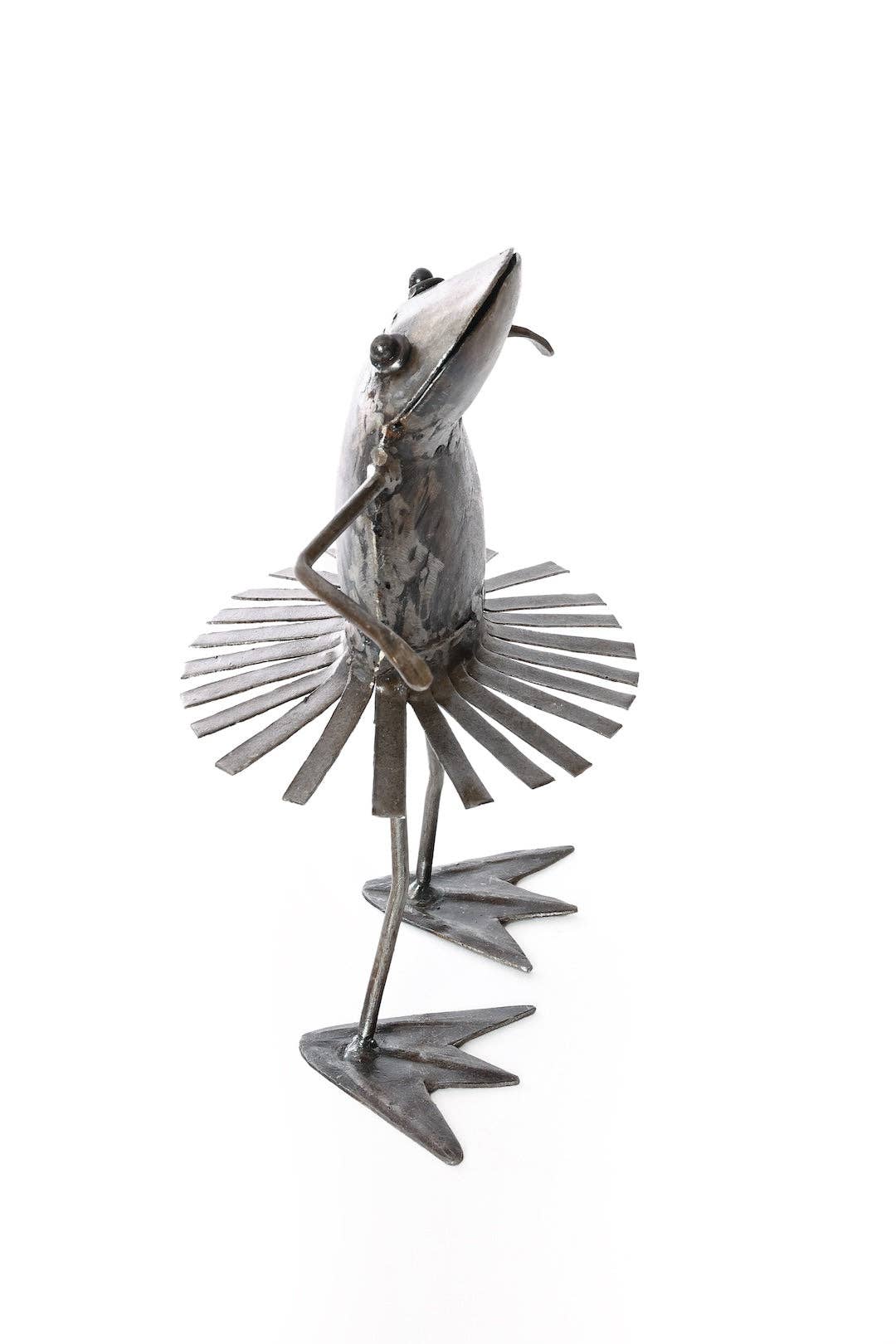 Metallic dancing frog with a swirling skirt - facing right.