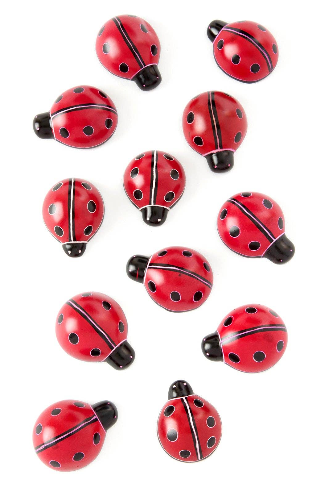 A dozen handcrafted soapstone ladybugs. 