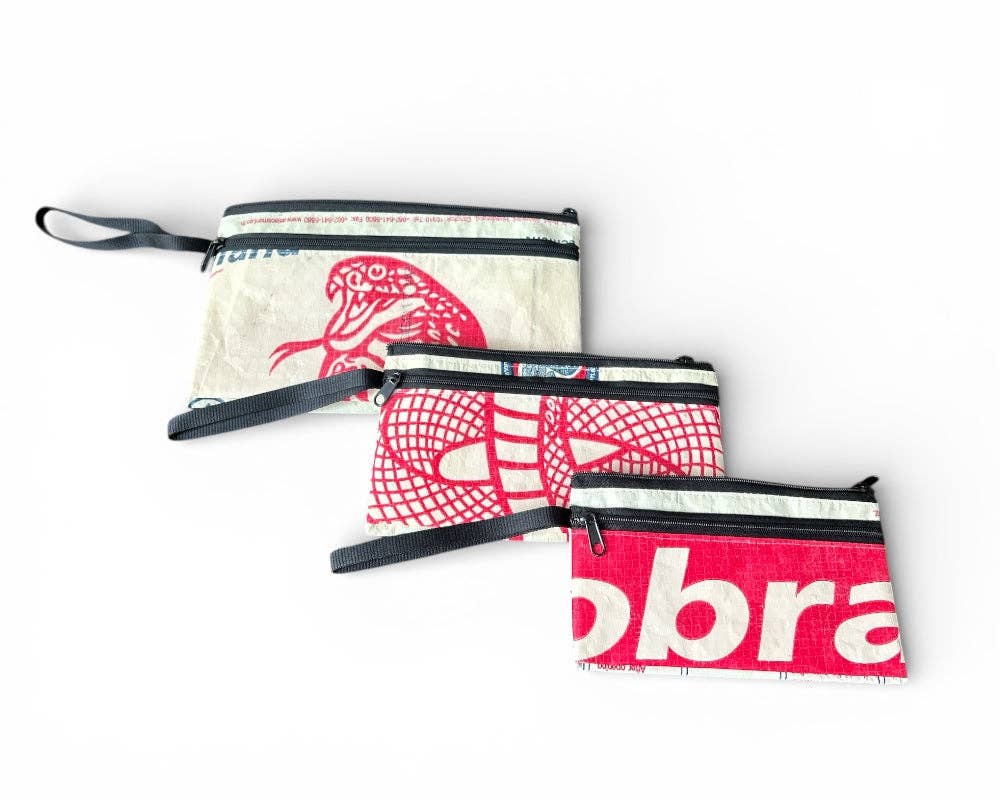Three pouches of descending size Exterior material is upcycled from feed and cement bags, Interior material is recycled from plastic bottles. Each design is unique.